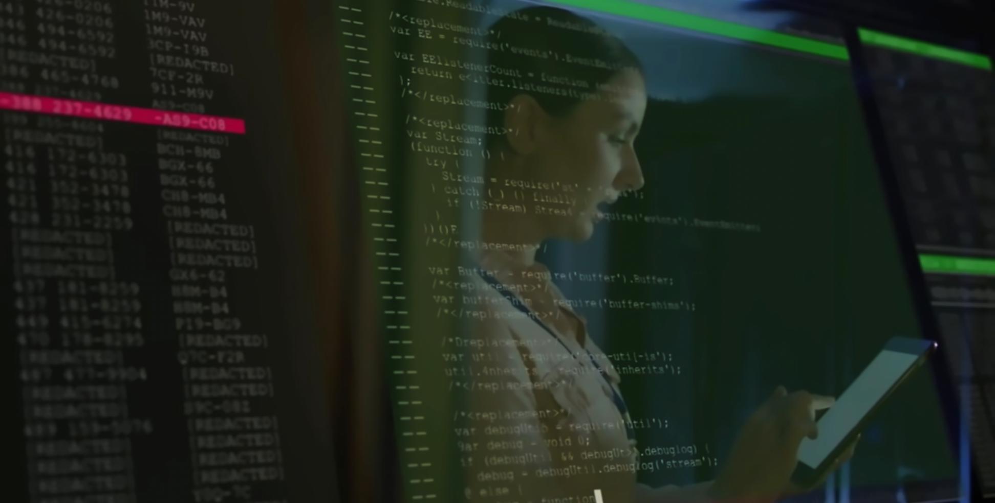Blockchain development workspace with multiple monitors showing smart contract code and testing frameworks
